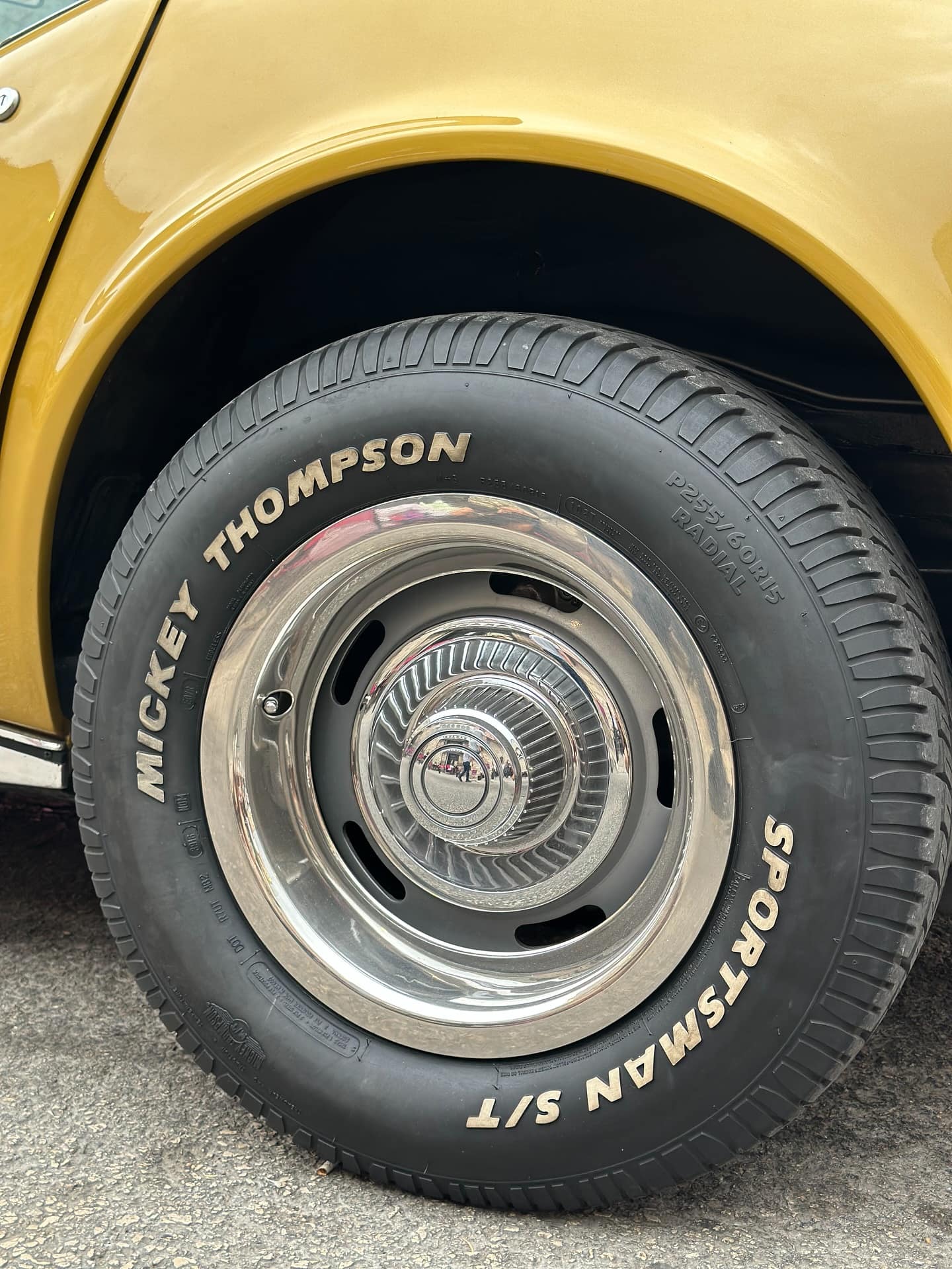 A Mickey Thompson tyre on a yellow muscle car
