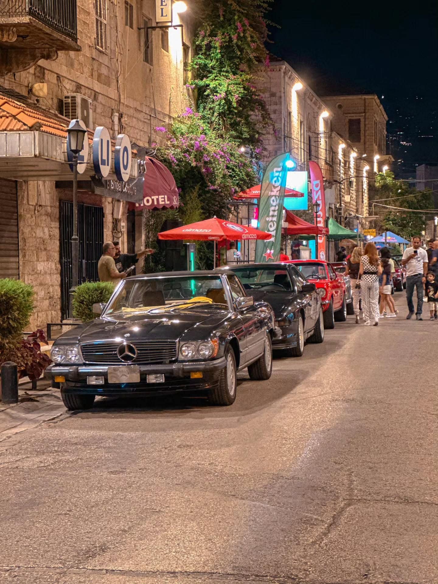 Classics parked along the old souk at dusk
