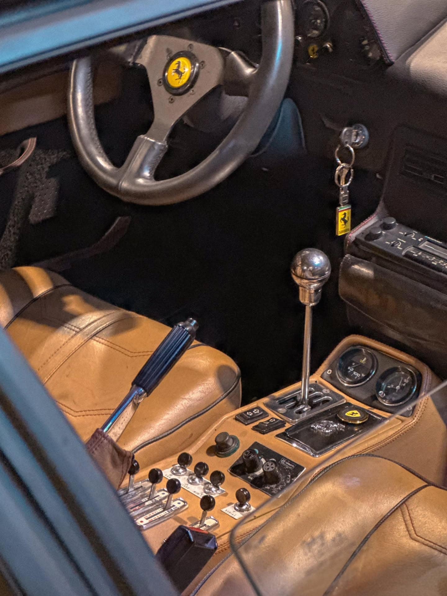A Ferrari interior with the gated shifter