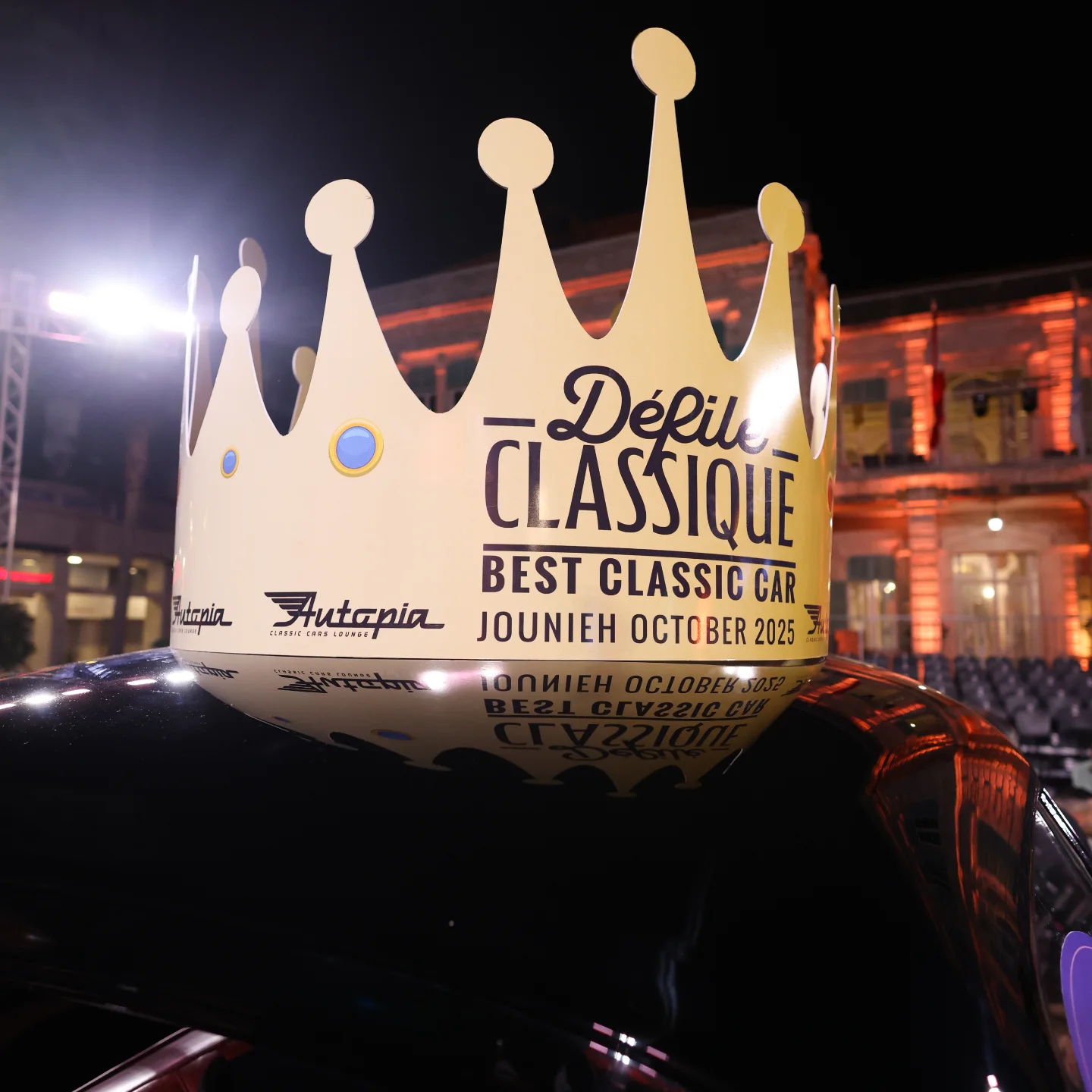 The Défilé Classique Best Classic Car crown, gold on the roof of the winning car