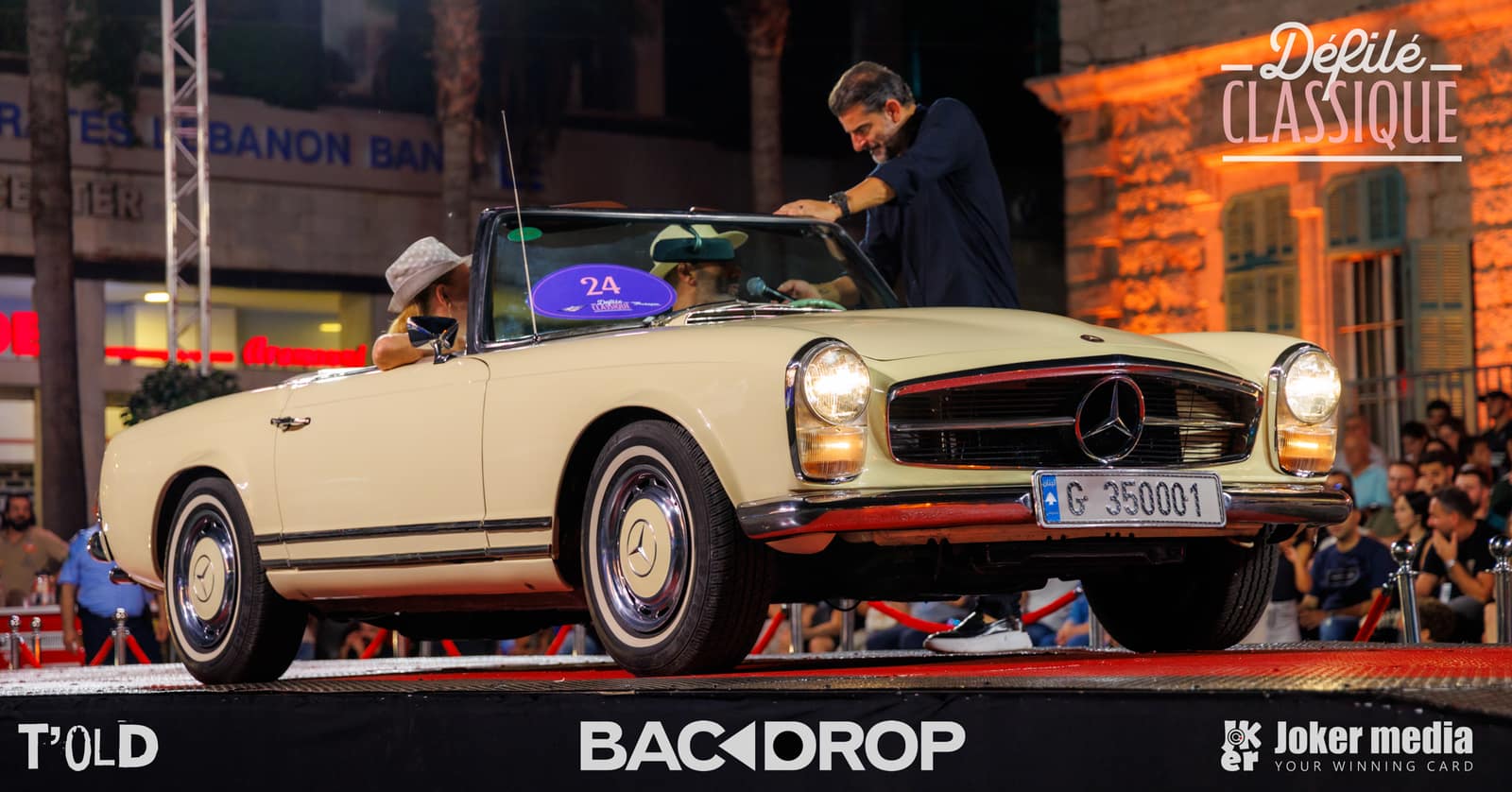 A classic car on the Défilé Classique stage, Backdrop production